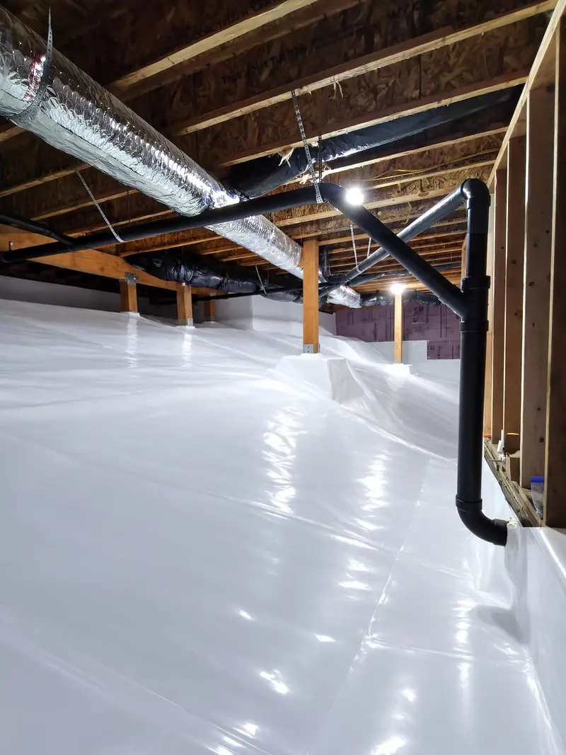 Finished crawl space with a sealed white liner